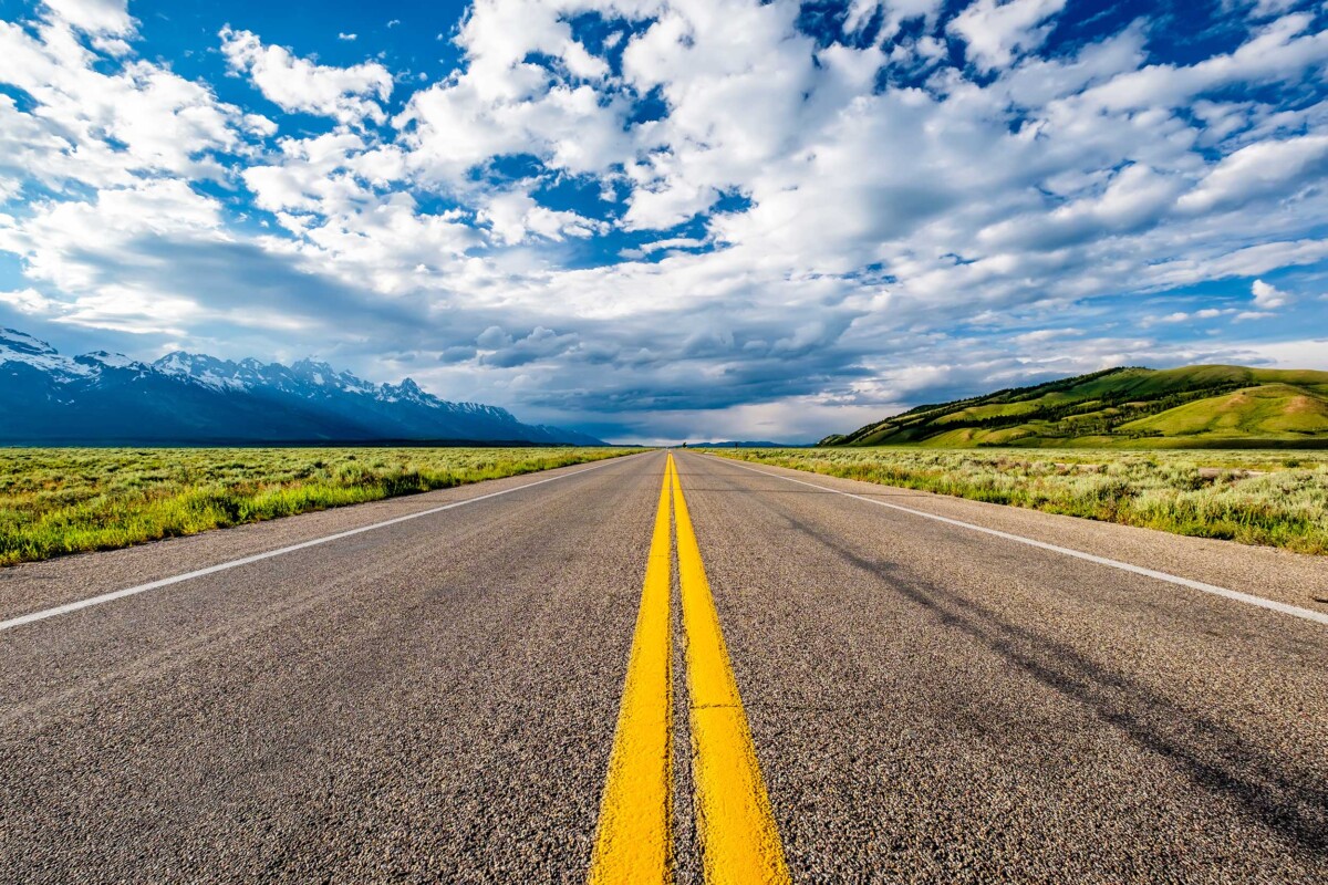Empty Open Highway In Wyoming Near the Tetons