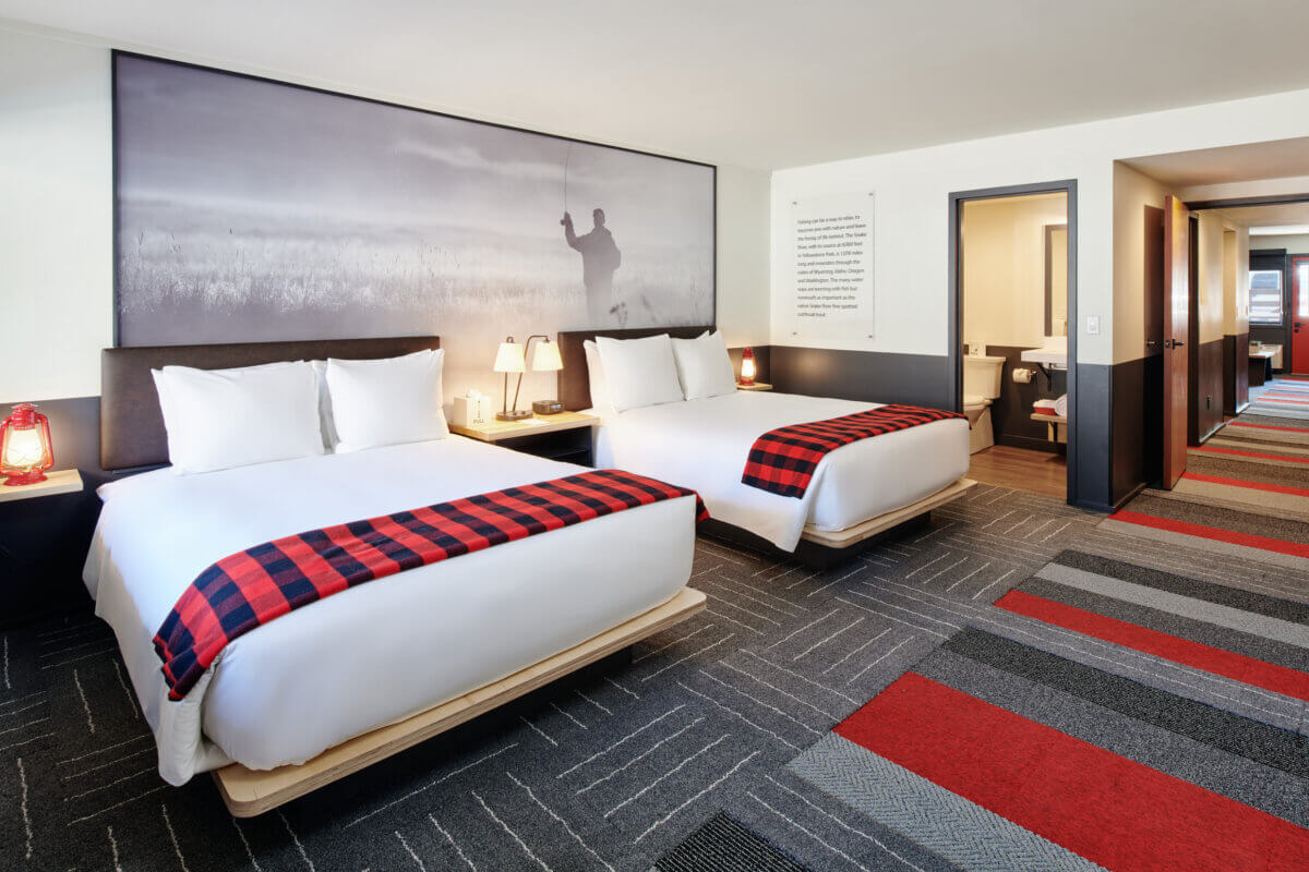 One Bedroom Two Queen Suite Bedroom towards living room hallway